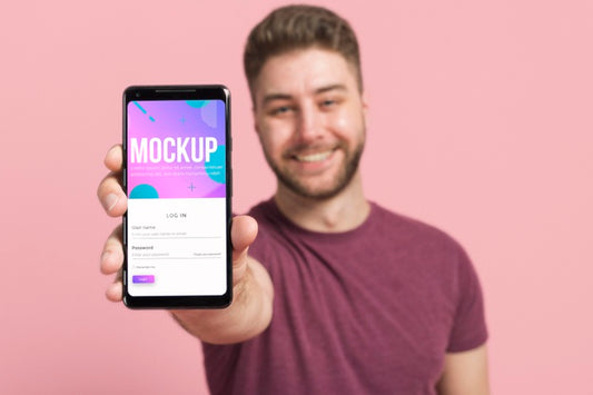 Free Blurred Man Showing Smartphone Digital Mock-Up Psd