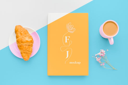 Free Book Cover Mock-Up Assortment With Cup Of Coffee And Croissant Psd