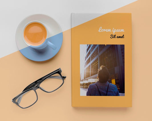 Free Book Cover Mock-Up Assortment With Cup Of Coffee And Glasses Psd