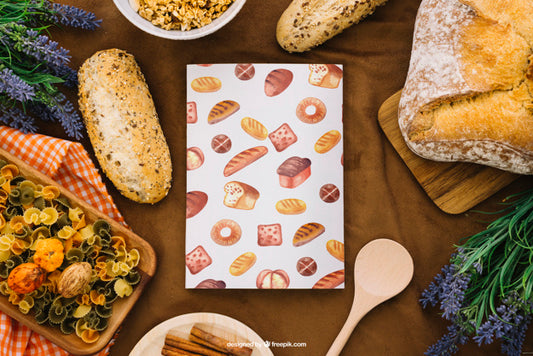 Free Book Cover Mockup With Bread And Pasta Psd