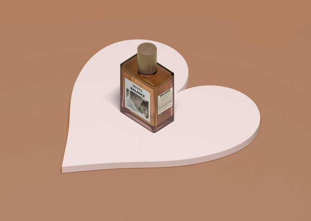 Free Bottle Of Perfume On Heart Shape Psd
