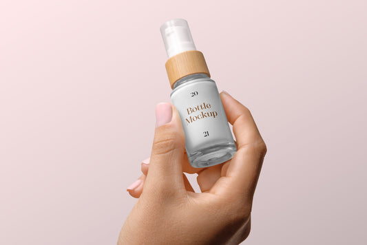 Free Bottle With Woman Hand Mockup