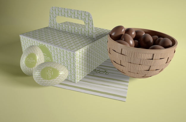 Free Box And Bowl With Easter Eggs On Table Psd