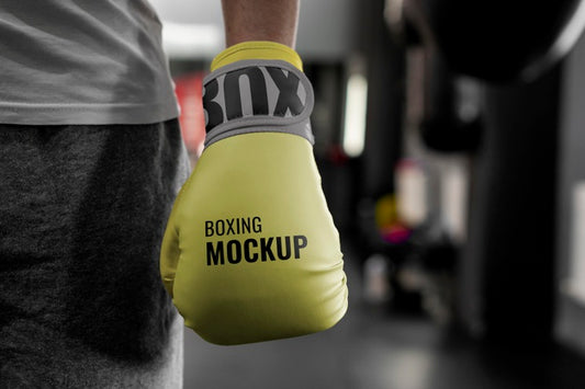 Free Boxing Athlete Wearing Mock-Up Gloves To Train Psd