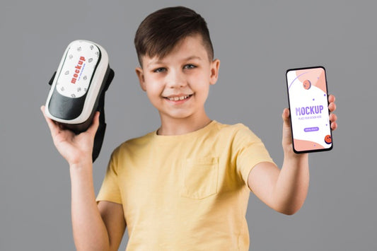 Free Boy Holding Virtual Reality Headset With Phone Mock-Up Psd