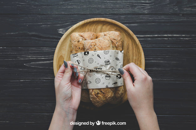 Free Bread Mockup With Hands Psd