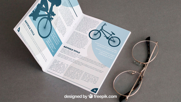 Free Brochure Mockup With Glasses Psd