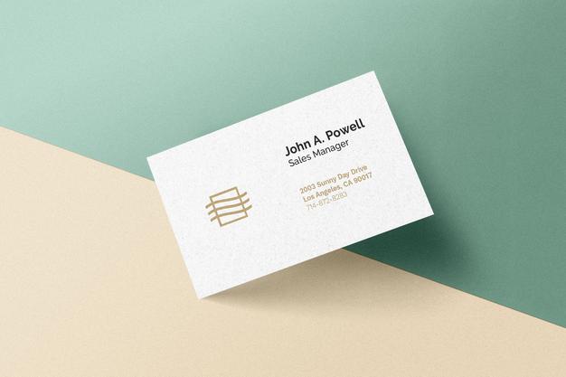 Free Business Card Laying On A Wall Mockup Psd