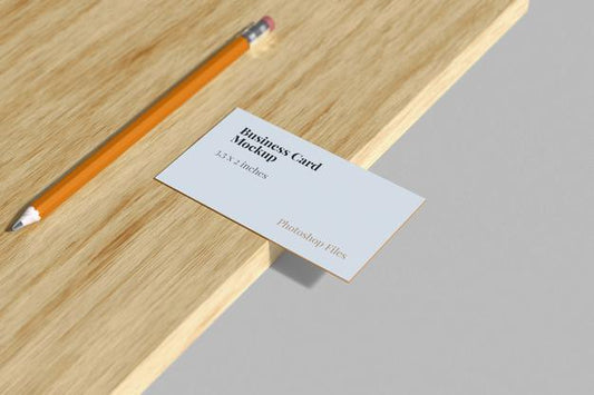 Free Business Card Mockup With Pencil On The Wood Psd