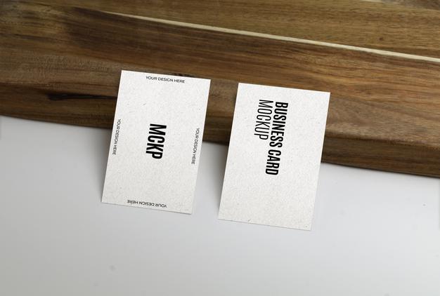 Free Business Card Over Wood Surface Mockup Psd