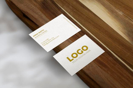 Free Business Cards Over Wood Surface Mockup Psd