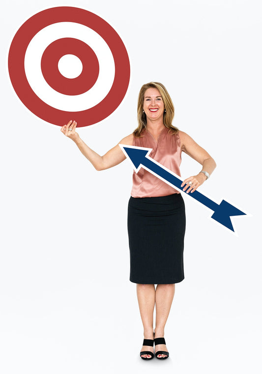 Free Businesswoman Holding An Arrow And A Dartboard