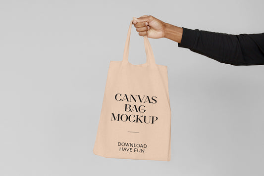 Free Canvas Bag With Hand Mockup