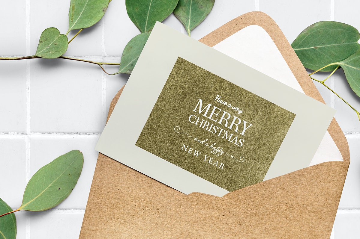 Free Card In An Envelope Mockup With Leaves In The Background