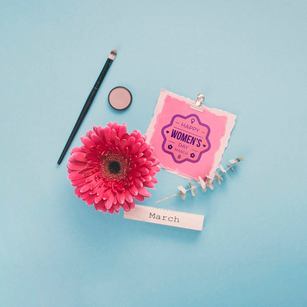 Free Cardboard Mock-Up With Flower And Make-Up On Blue Background Psd