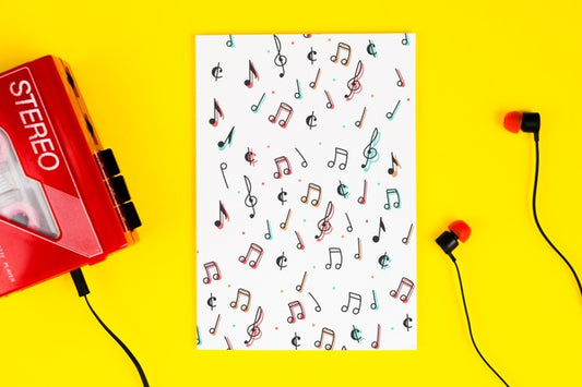 Free Cassette With Headphones And Musical Notes On Sheet Psd
