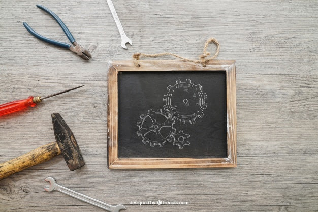 Free Chalkboard And Tools On Wooden Texture Psd