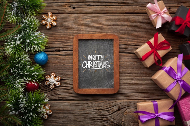Free Chalkboard Mock-Up And Gifts With Christmas Pine Leaves Psd