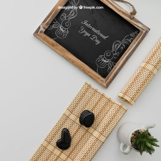 Free Chalkboard With Bamboo Cloths And Plant Psd