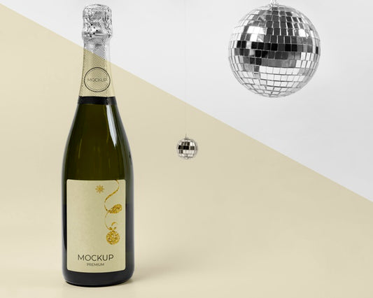 Free Champagne Bottle Mock-Up And Disco Balls Psd