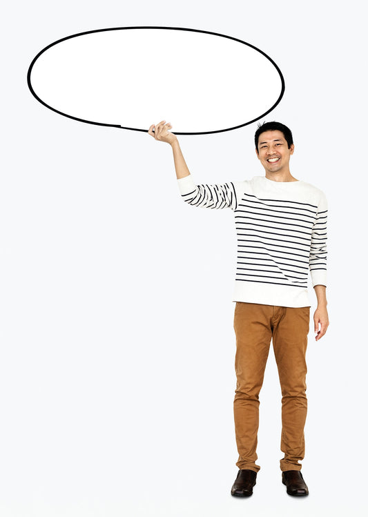 Free Cheerful Man Holding A Blank White Board