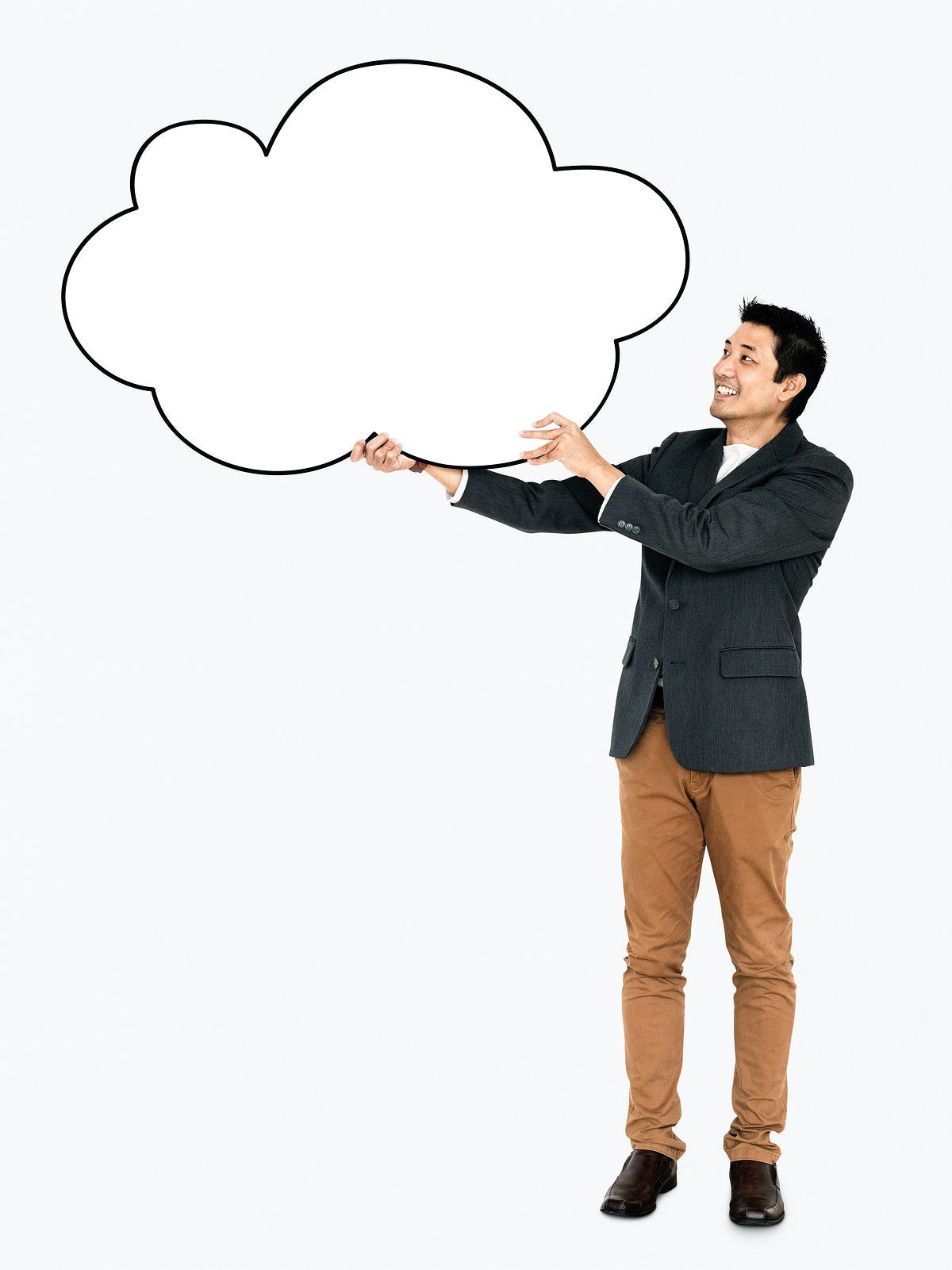 Free Cheerful Man Showing A Blank Cloud Shaped Board