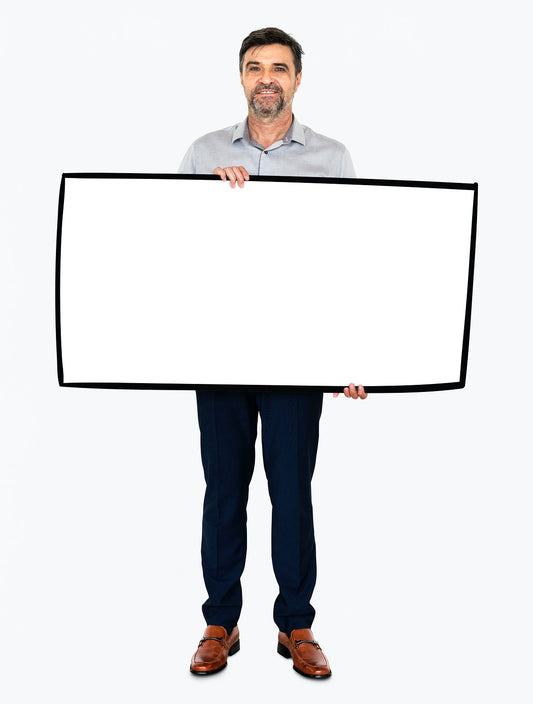 Free Cheerful Man Showing A Blank White Banner