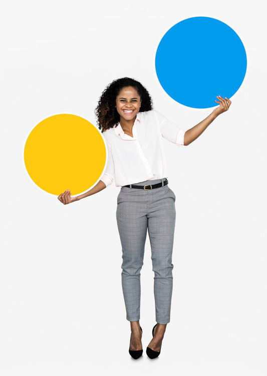 Free Cheerful Woman Holding Colorful Round Boards Psd