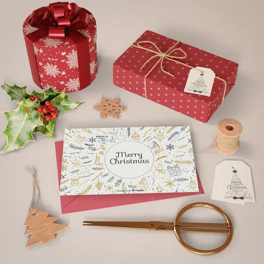 Free Christmas Card And Gifts Collection On Table Psd
