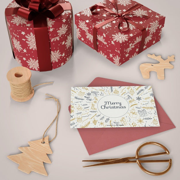 Free Christmas Card With Gifts Beside Psd