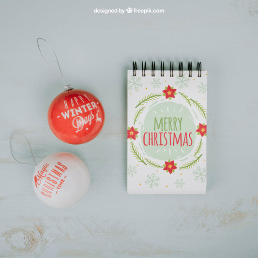 Free Christmas Mockup With Notepad And Balls Psd