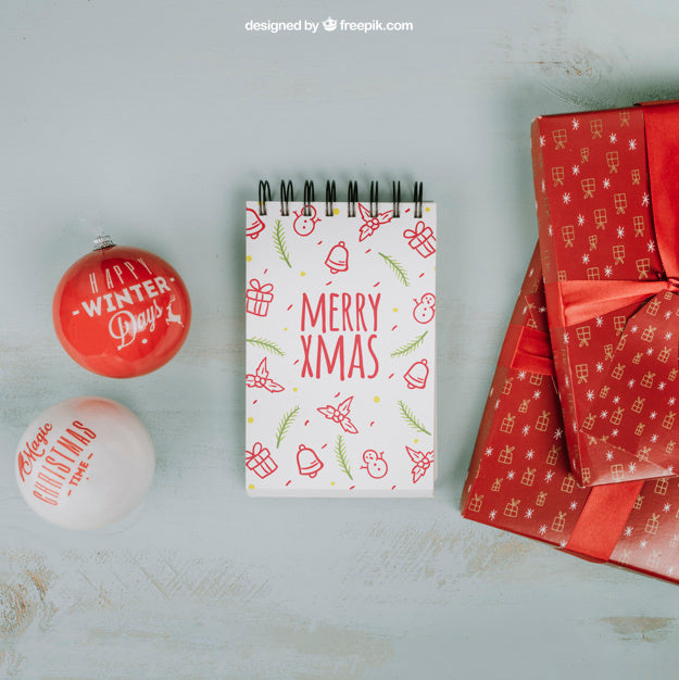 Free Christmas Mockup With Notepad And Gift Boxes Psd