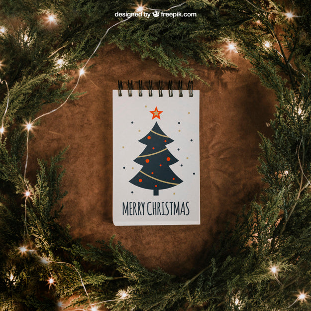 Free Christmas Mockup With Notepad And String Lights Psd