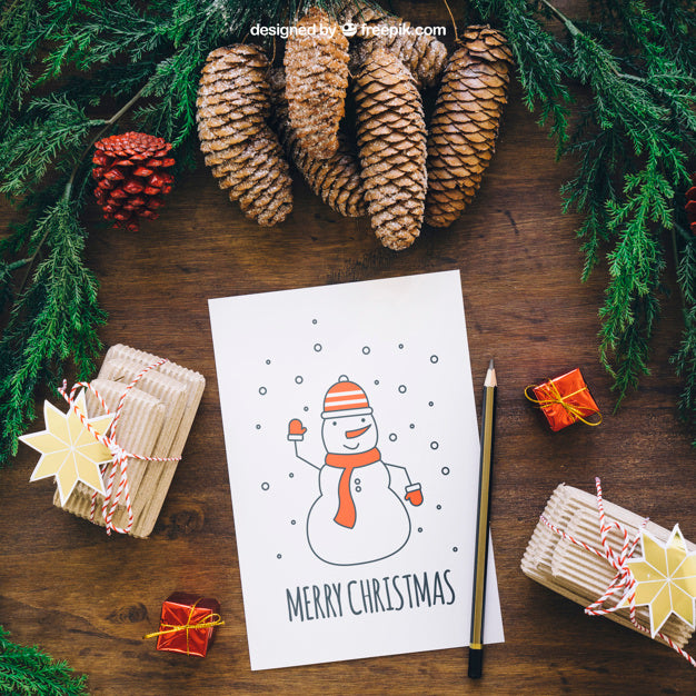 Free Christmas Mockup With Pine Cones And Card Psd