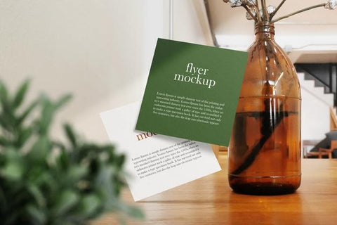 Free Clean Minimal Square Flyer Mockup Floating On Wood Top In Cafe Background. Psd File. Psd