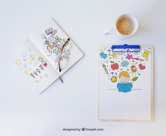Free Clipboard And Notebook With Colorful Drawings Psd