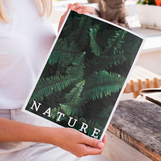 Free Close-Up Hands Showing A Nature Magazine Mock Up Psd