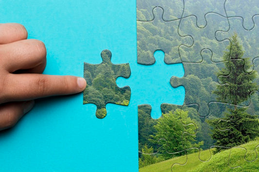 Free Close-Up Man Making A Puzzle Psd