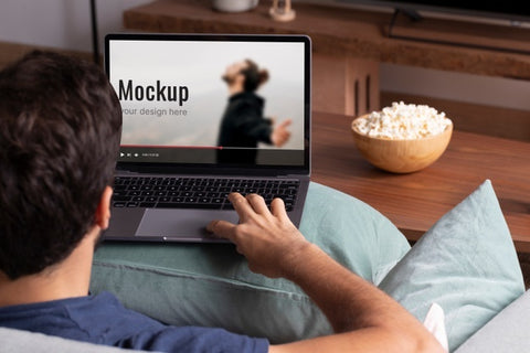 Free Close Up Man Watching Movie On Laptop Mockup Psd