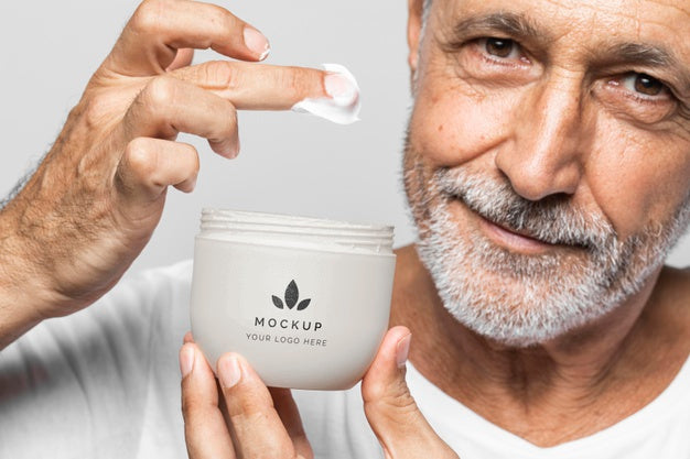 Free Close Up Senior Man Holding Cream Container Psd