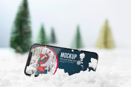 Free Close Up Smartphone In Snow Psd