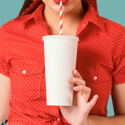 Free Close Up Woman Drinking With Straw Psd