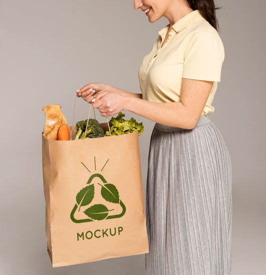 Free Close Up Woman Holding Bag With Vegetables Psd