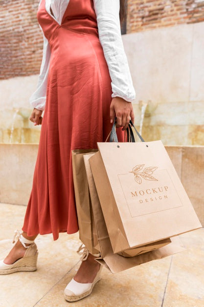 Free Close Up  Woman Holding Shopping Bags Psd
