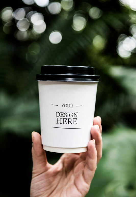Free Closeup Of Hand Holding Paper Cup Psd
