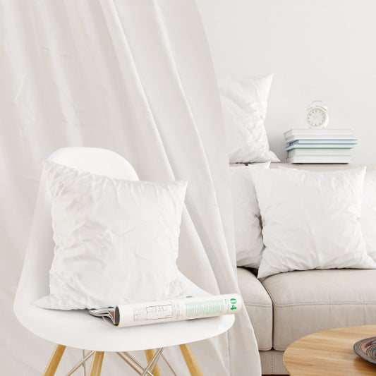 Free Closeup Of White Pillowcase On A Modern Chair Mockup Psd