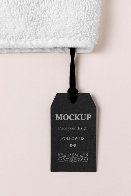 Free Clothing Mock-Up Tag And White Towel Psd
