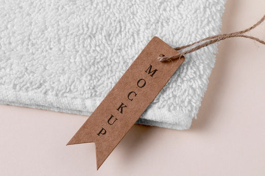 Free Clothing Mock-Up Tag And White Towel Psd