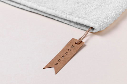 Free Clothing Mock-Up Tag On Soft Towel Fabric Psd