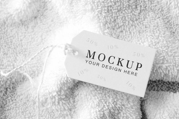 Free Clothing Mock-Up Tag With Thread On Towel Psd